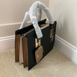 Dune Handbag. 13 inches by 10 inches. Shoulder strap and hand straps. Purse incl